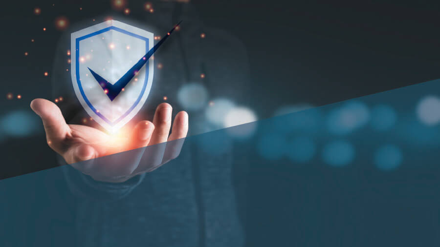 A hand holding a glowing digital shield icon with a checkmark, representing high data security standards of eRunlite cloud POS system certified by SRAA and PIA assessments.
