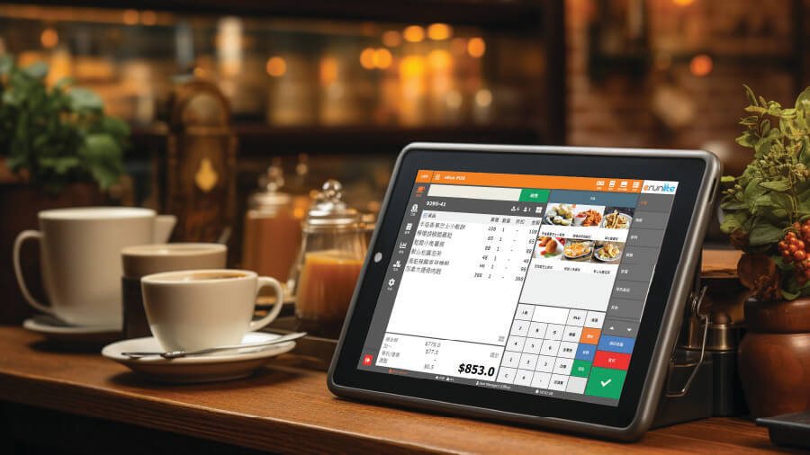 An iPad tablet displaying the eRunlite catering POS system user interface on a cafe counter, showing how small business owners can turn an old iPad into a smart cash register.